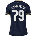 Back view of a dark navy blue soccer jersey with 'JOÃO FÉLIX' and the number '79' printed in white on the back, featuring gold and navy striped sleeve cuffs.